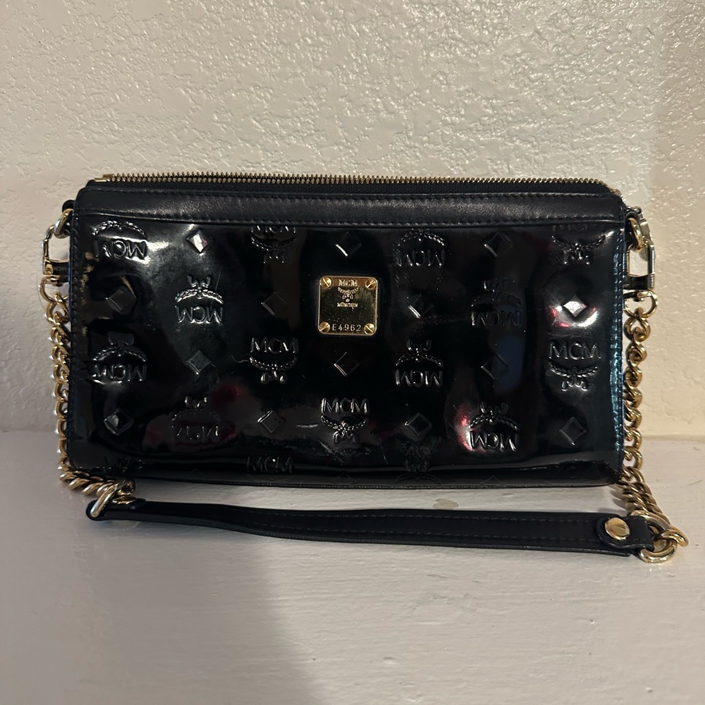 MCM Black Patent Leather Clutch with Gold Accents
